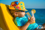 Boy at beach on family holiday