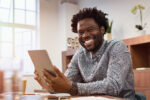 dad-with-tablet-smilng