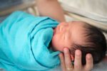 Swaddled baby ready for sleep