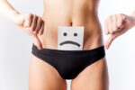 woman in undies unhappy face