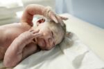 Doctor Puts Her Own Birth On Hold To Deliver Baby