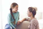 mum and tween daughter talking