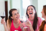 women laughing with wine | things for mum