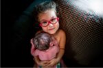 three year old helps deliver baby brother