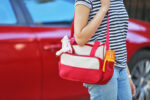 mum carrying handbag