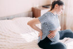 pregnant woman experiencing pelvic girdle pain or lightning crotch