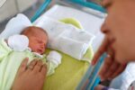 newborn and mother in hospital