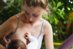 breastfeeding mum in park