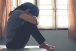 woman depressed anxious | postpartum anxiety