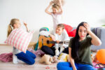Stressed mum at home with kids