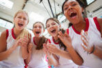 teenage girls playing sport