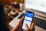 Facebook likes, woman holding phone, social media