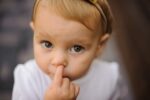 Child picking nose random objects stuck in bodies