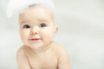toddler in bath