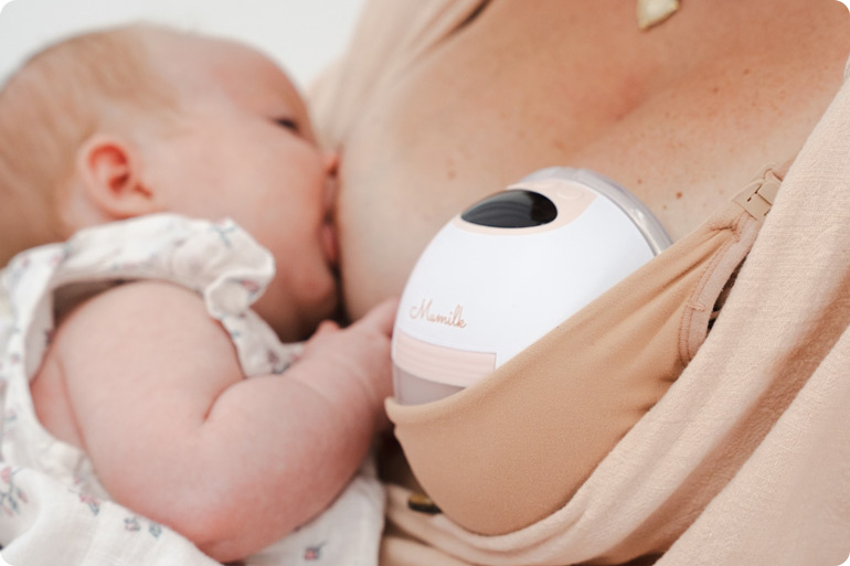 We Asked Mums to Vote for the Best Breast Pump in Australia. They Chose the Mumilk Ella. Again. 4 Baby breastfeeding with a wearable breast pump