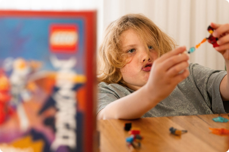 GO FULL NINJA: Our Family Took On LEGO® NINJAGO Destiny’s Bounty Adventures & Won! 7 Young boy playing with LEGO bricks LEGO Ninjago